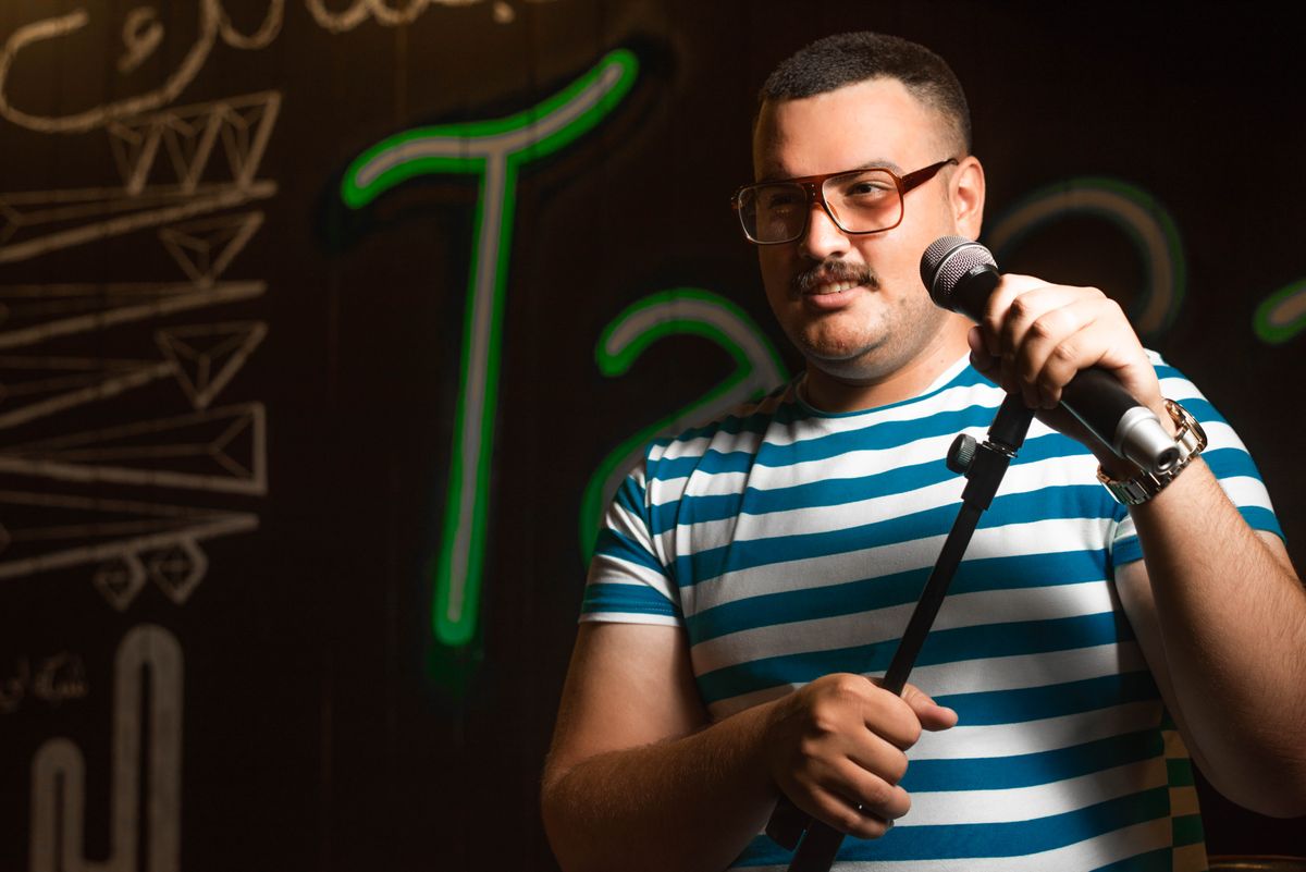 Stand-up Comedians live performance on a corporate stage — book Stand-up Comedians through Shakti Event